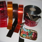 Il Polipropilene Metallizzato, anche nella versione stampata con una tinta unita, può essere impiegato come film interno per l'incarto a doppio fiocco di caramelle, cioccolatini, torroncini
